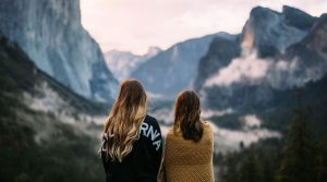 Two girls looking over the mountains on gap year travels