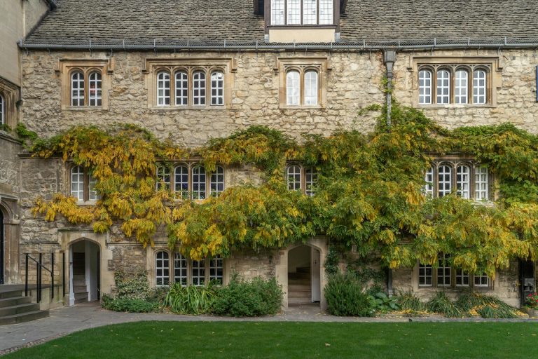 The ivy growing off a building in Oxford, captured on one of Written From Travels adventures to Oxford and Cambridge.